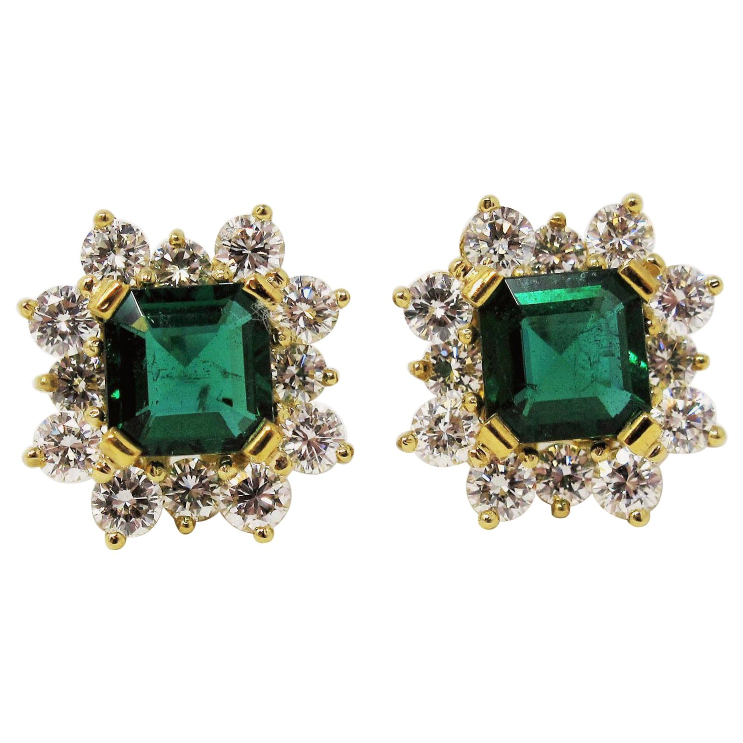 4.70 Carat Emerald Cut Emerald and Diamond Halo Stud Earrings 18 Karat Gold For Sale