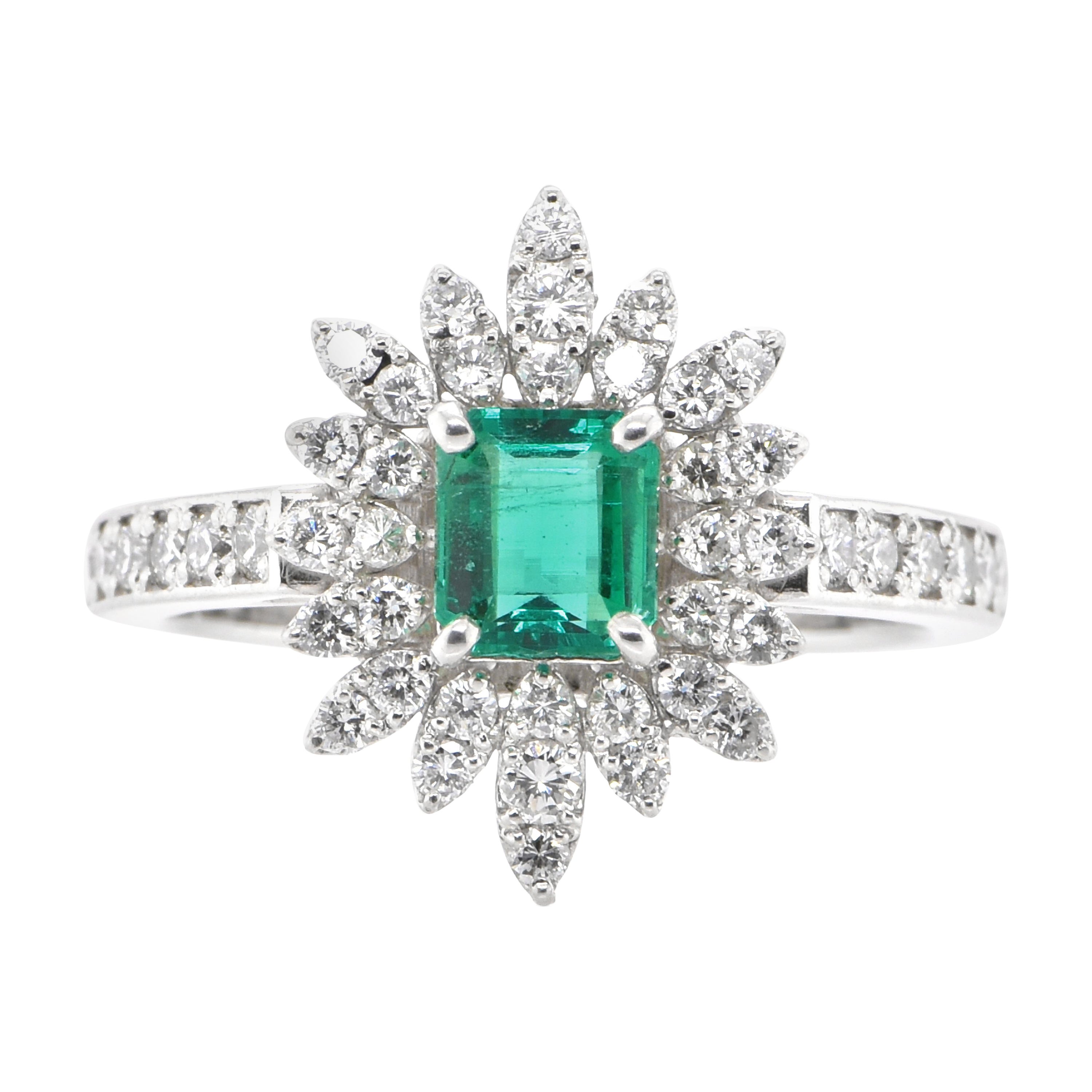 0.65 Carat Natural Emerald and Diamond Double Halo Ring Set in Platinum