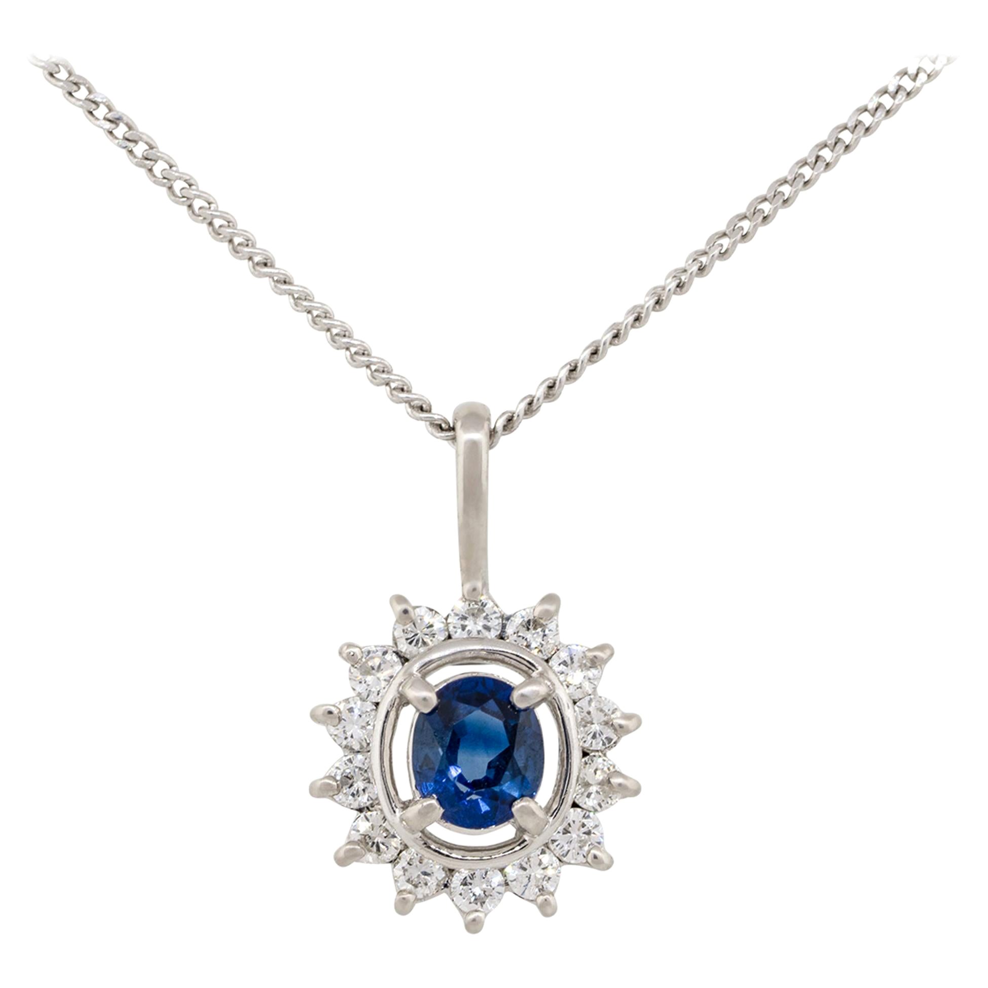 0.41 Carat Oval Floating Sapphire Pendant Necklace with Diamonds Platinum For Sale