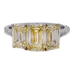 3.35 Carat Yellow Diamond Emerald Cut Three-Stone Engagement Ring, Platinum.