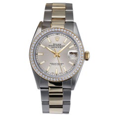 Rolex Montre Datejust en acier inoxydable et or jaune avec lunette en diamants