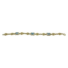 Nobile bracciale A Link in oro 14k con acquamarina