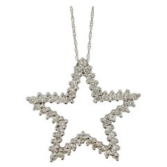 Pendentif étoile blanche en diamants ronds et brillants de style Tiffany. 