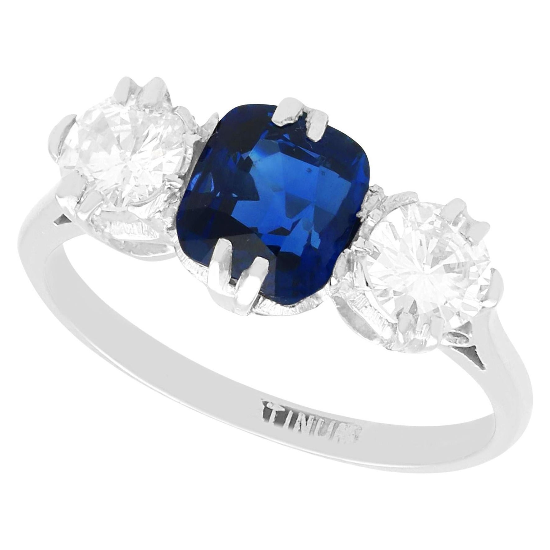 Antique 1.33 Ct Basaltic Sapphire and 0.88 Ct Diamond Platinum Trilogy Ring For Sale