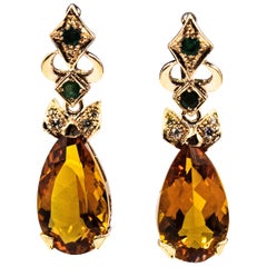 Boucles d'oreilles à levier de style Art déco en or jaune avec diamants blancs, émeraudes et citrines