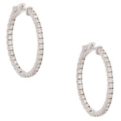 Boucles d'oreilles en forme d'anneau avec un diamant de 2,70 carats 14 carats en stock