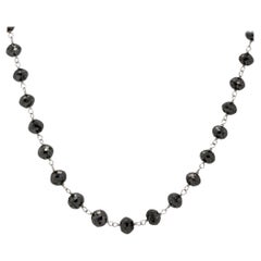 Collana di diamanti sfaccettati tondi neri da 28 carati 14 carati in stock