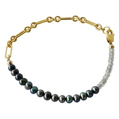 Bracelet en perles noires et labradorite avec chaîne remplie d'or J Dauphin