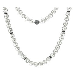 Halskette aus geschnitztem Bergkristall, Onyx und Diamanten
