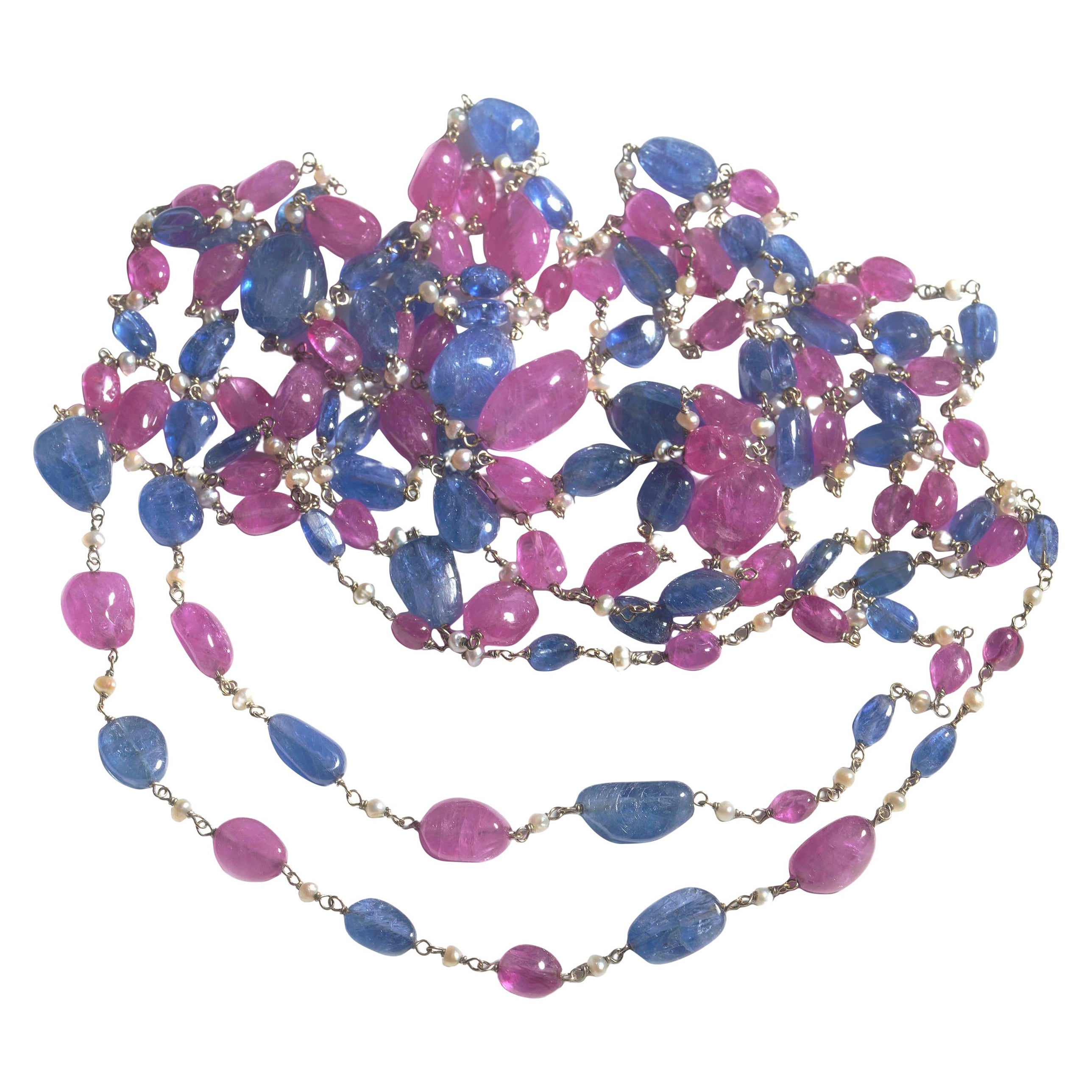 Collier longue chaîne saphir, rubis, perle et or blanc
