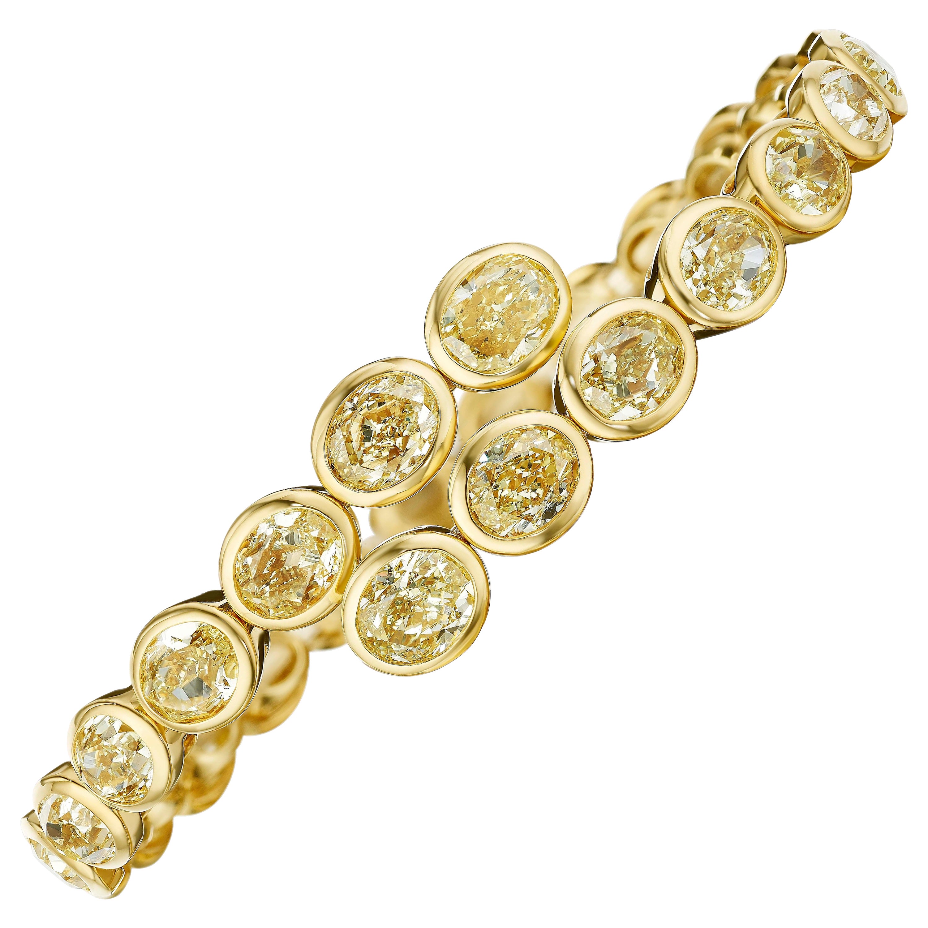 Oval Yellow Diamond Bezel Set Bangle Bracelet For Sale
