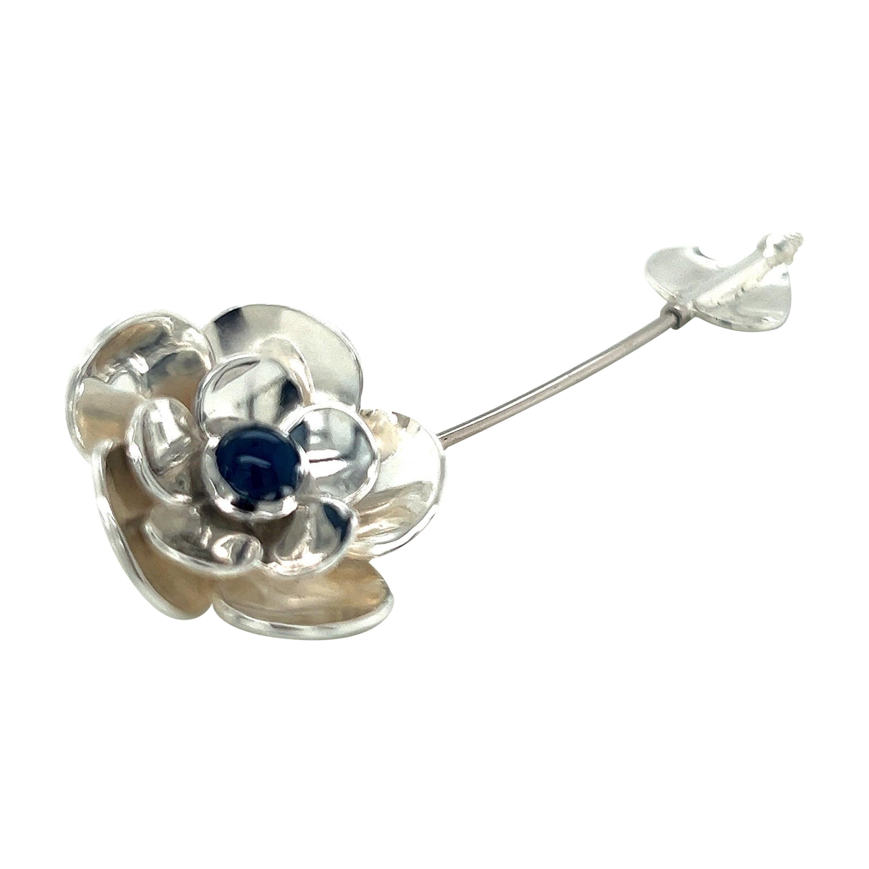 Sterling Silver, Platinum, and 14k White Gold Flower Pin with Cabochon Sapphire For Sale