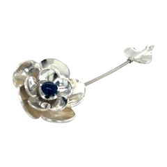 Sterling Silver, Platinum, and 14k White Gold Flower Pin with Cabochon Sapphire