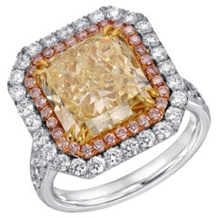 EGL Certified 5.57 Ct. VVS1 Fancy Yellow Diamond Halo Engagement 18K Gold