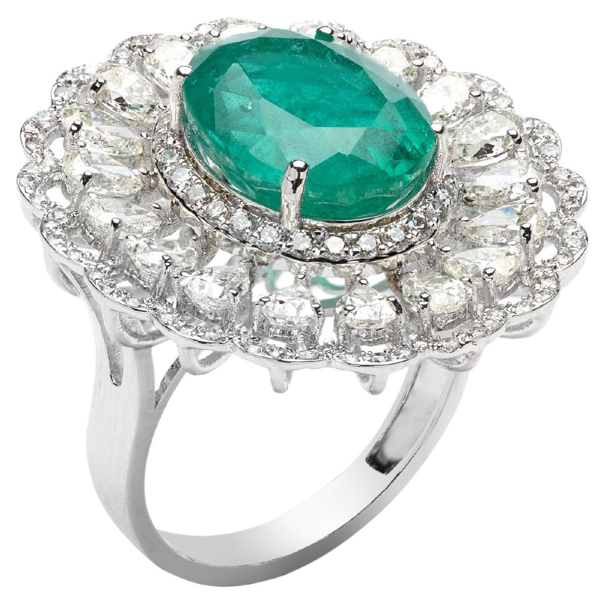 Natural Zambian Ring with 6.30carats Emerald and 3.11carats Diamond /14k For Sale