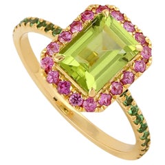 Ring aus 14 Karat Gold mit Peridot, rosa Saphir und Tsavorit