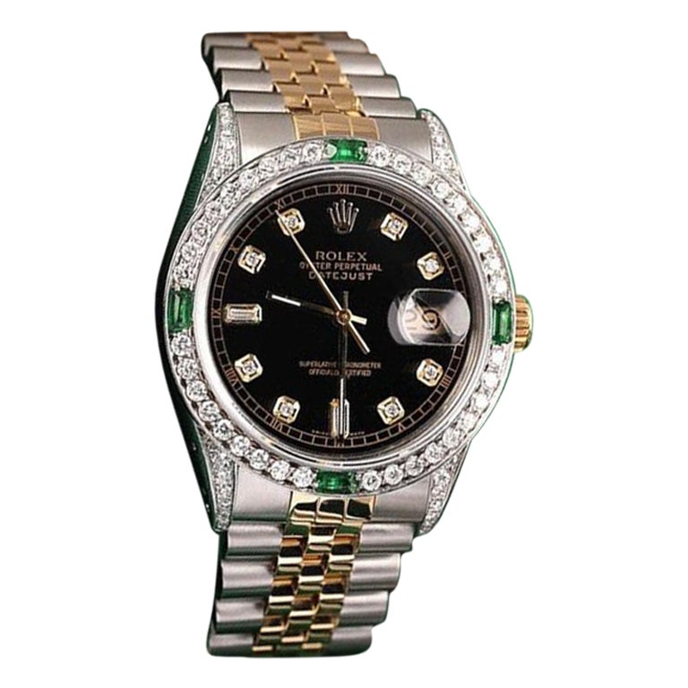 Rolex Montre Datejust à cadran noir avec numéros ronds et baguettes et émeraudes 16013