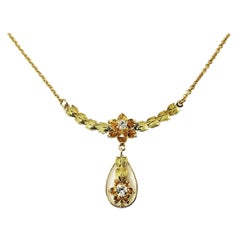 Vintage 14 Karat Yellow / Rose Gold and Diamond Floral Necklace