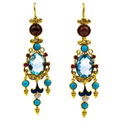Boucles d'oreilles en or jaune avec diamants blancs, rubis, topaze bleue, turquoise, émail et tourmaline