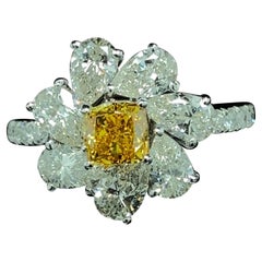 0.80 Carat GIA Certified Fancy Vivid Orangy Yellow Diamond and Diamond Gold Ring