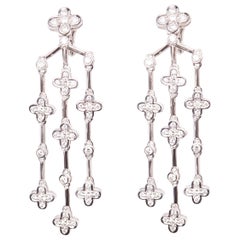 Boucles d'oreilles chandelier en or blanc 18 carats avec diamants