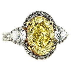 Platinum 3.16ct Oval GIA Certified Natural Yellow VVS Diamond Engagement Ring