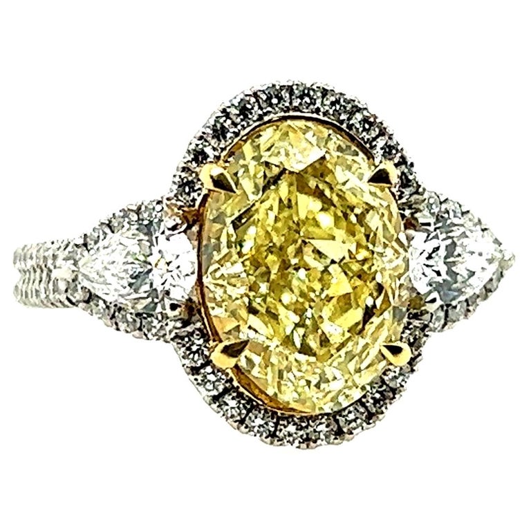 Platinum 3.16 CT Oval GIA Certified Natural Yellow VVS Diamond