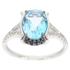 White Gold Ring with Diamonds and Beautiful Topaz with Sapphire