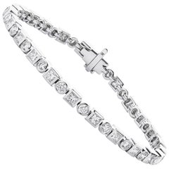 Round Brilliant Cut and Princess Cut Diamond Tennis Bracelet