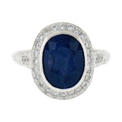 Estate Platinum GIA Oval Ceylon Bezel Sapphire Pave Diamond Halo Engagement Ring