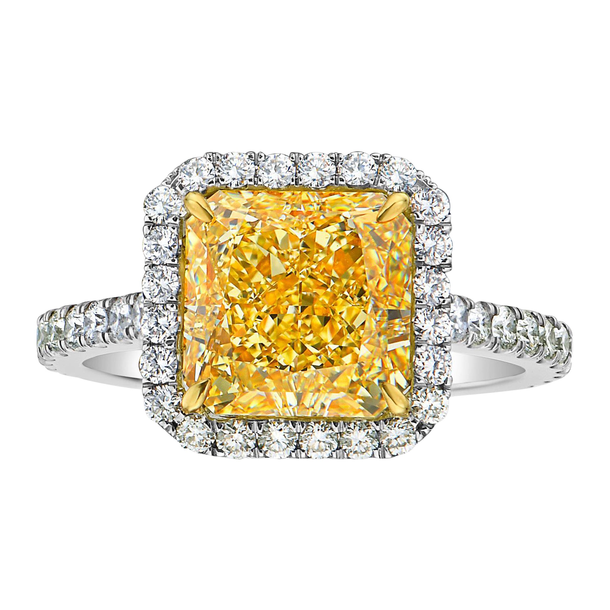 4 Carat Fancy Light Yellow Radiant Diamond Halo Ring For Sale