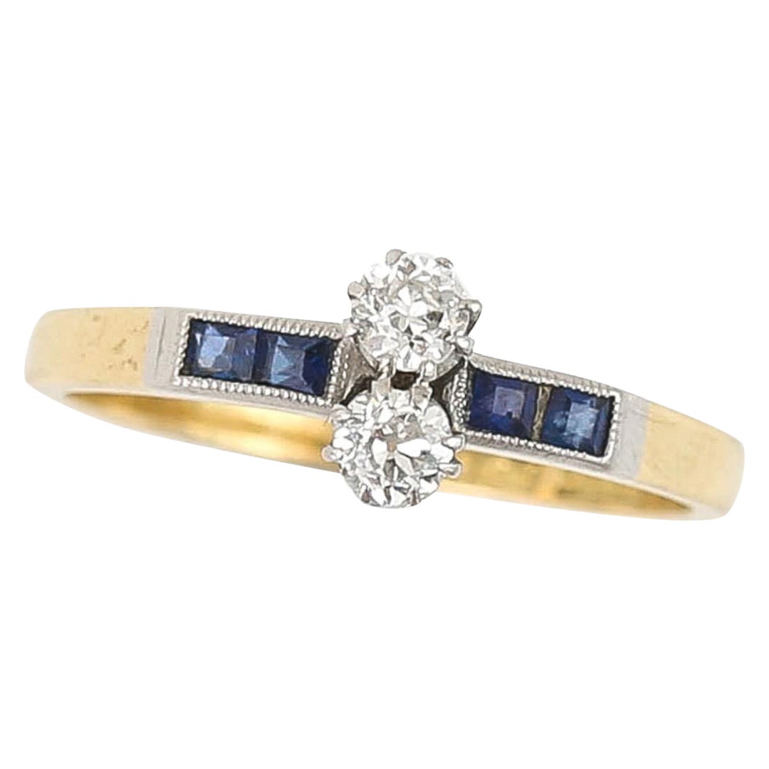 Edwardian 18ct Gold Old Cut Diamond Two Stone and Sapphire Ring, circa 1915 For Sale