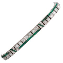 Antique Circa 1920s Art Deco 3 Carat Emerald and 5.2 Carat Diamond Platinum Bracelet