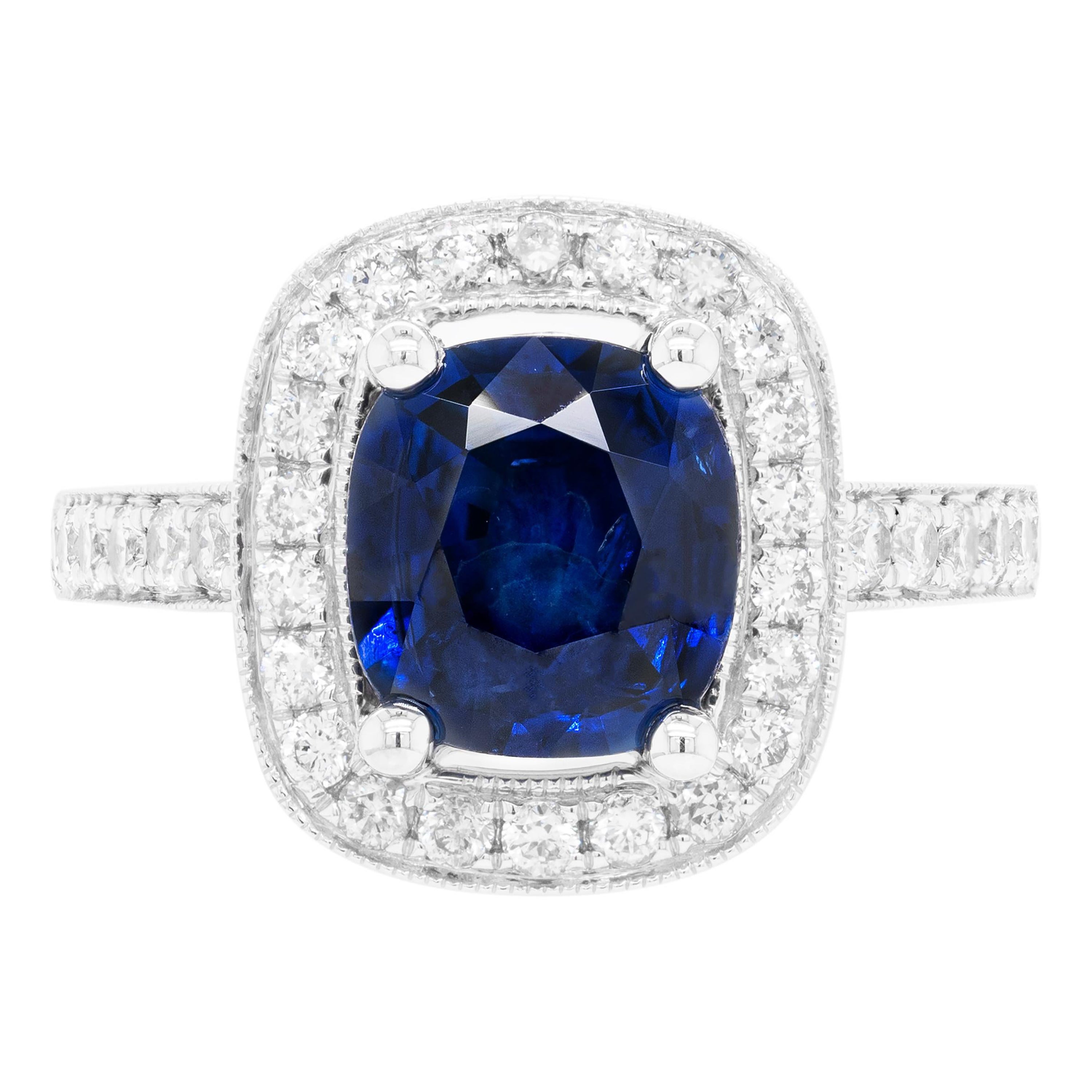 2.52ct Blue Sapphire & Diamond 18 Carat White Gold Halo Cluster Engagement Ring For Sale