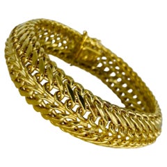 Gewebtes Vintage-Armband mit Wirbeln aus 18 Karat Gold