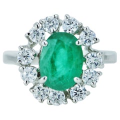 Natural 2.35 Carat Emerald Halo Ring