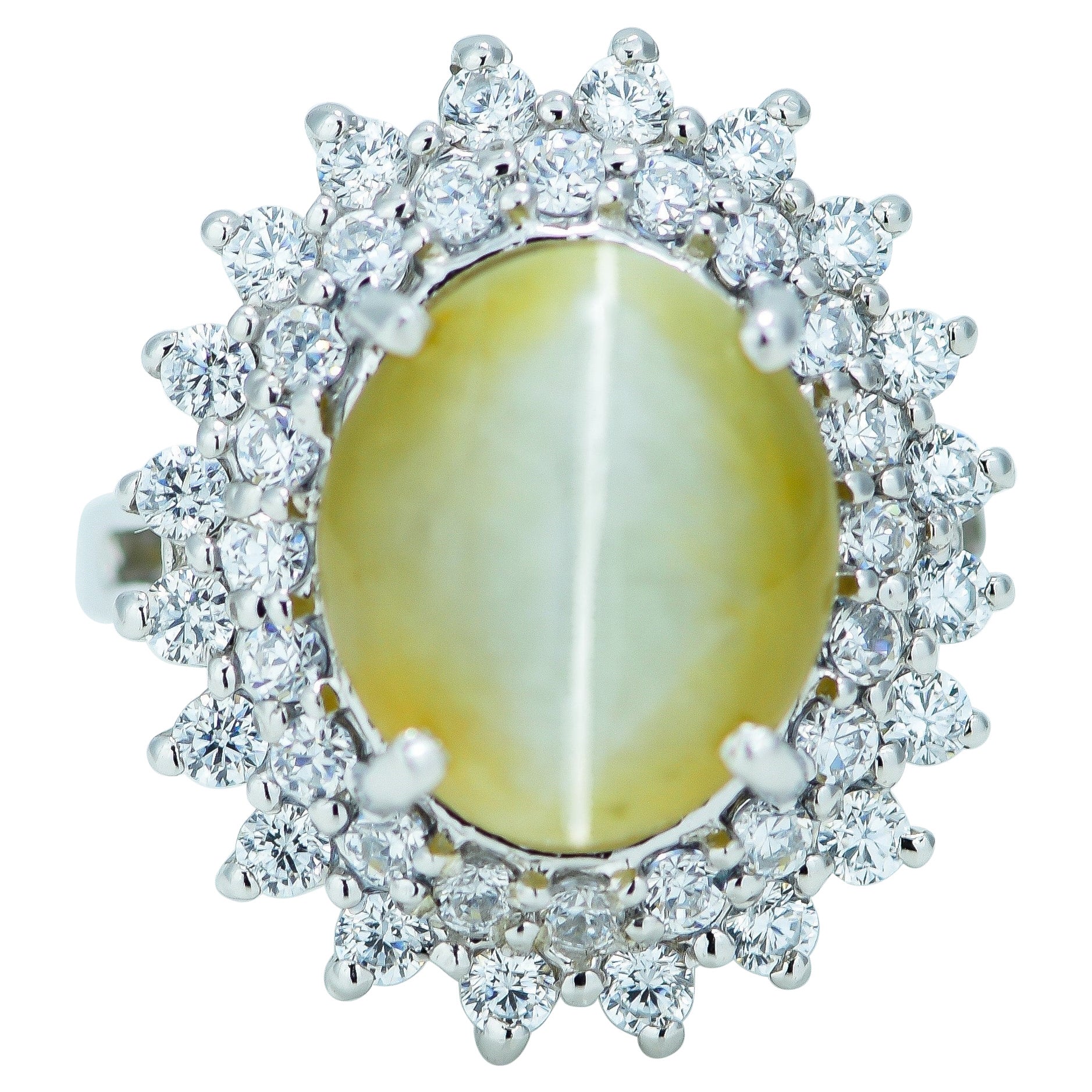 Natural 4.12 Carat Cats Eye Double Halo Ring For Sale
