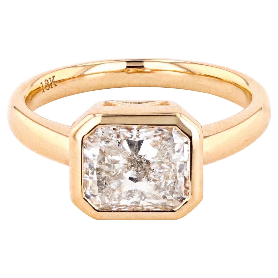 2.29 Carat Radiant Cut East-West Bezel Set Diamond Ring For Sale