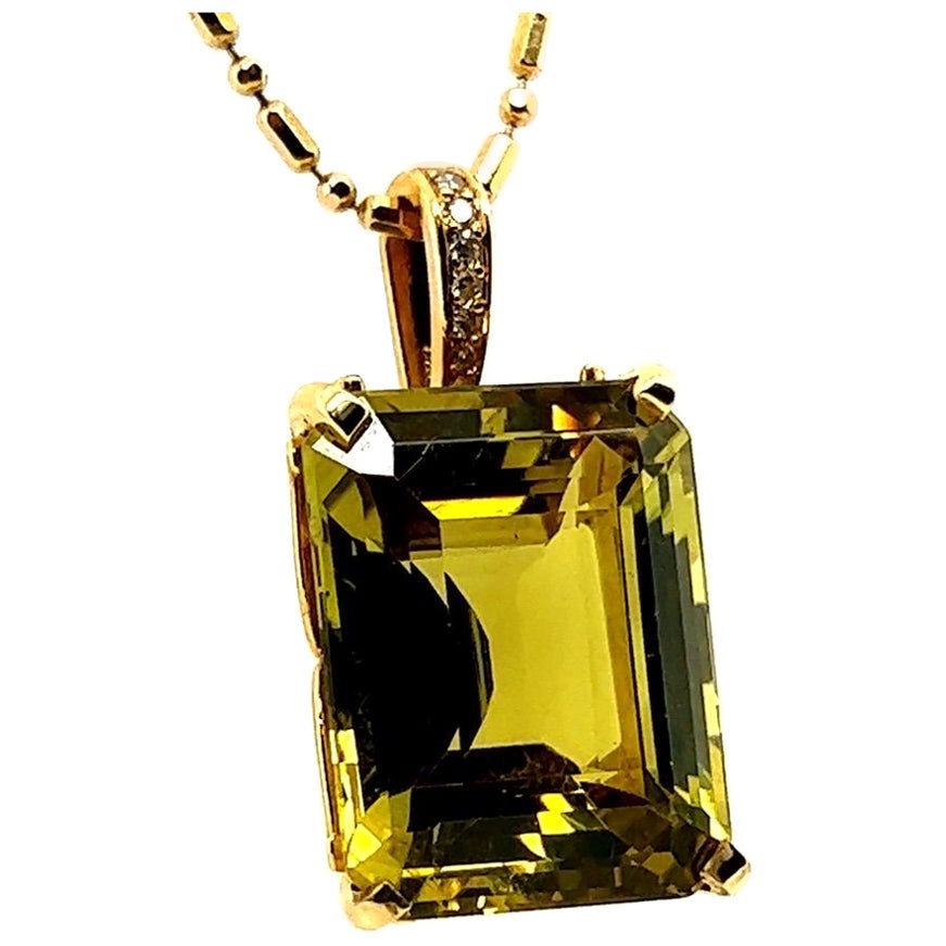 Retro GIA Certified 23.67 Carat Greenish Yellow Natural Chrysoberyl Gold Pendant For Sale