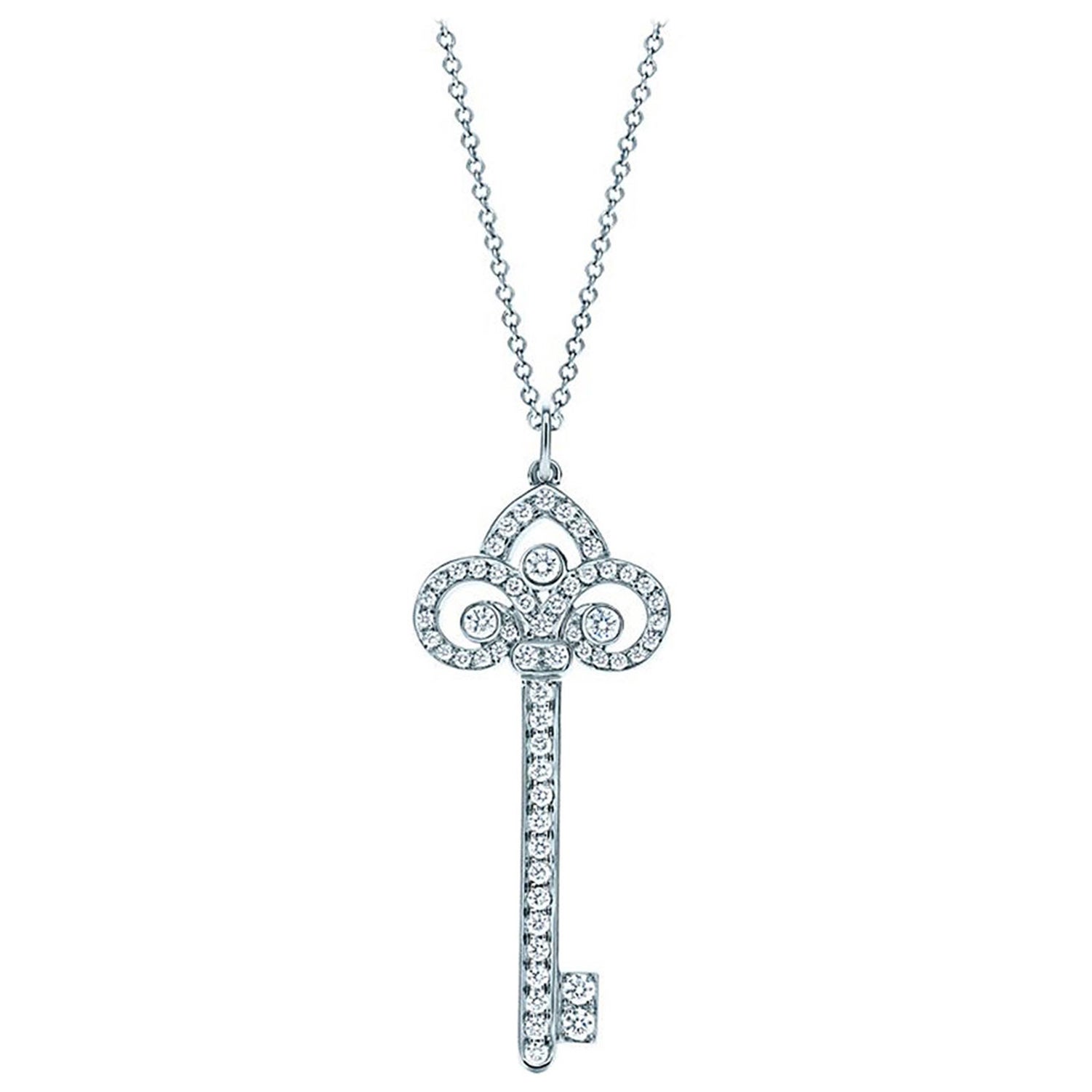 Rare Tiffany & Co. Collier pendentif clé Fleur de Lis en platine et diamants