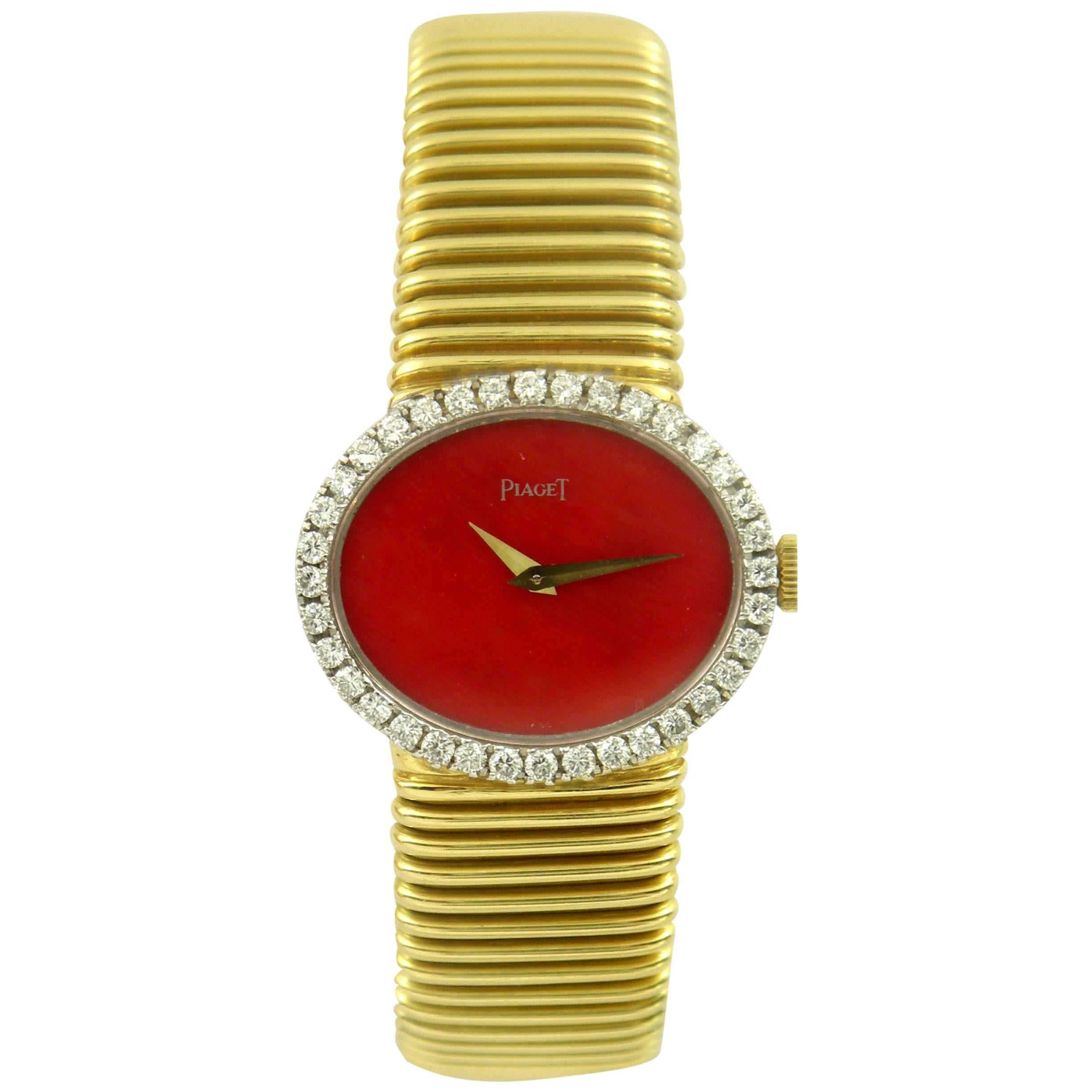 Piaget Ladies Yellow Gold Diamond Coral Dial Tubogas Bracelet Wristwatch