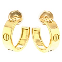 Cartier Boucles d'oreilles créoles Love en or jaune 18 carats