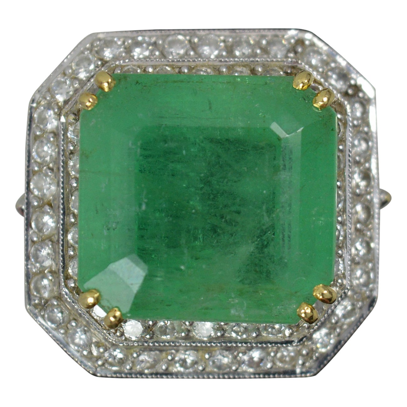 Huge 15 Carat Emerald and 1Carat Diamond 18 Carat Gold Cluster Cocktail Ring For Sale