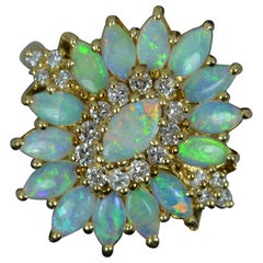 Striking 18 Carat Gold Natural Opal and Diamond Cluster Cocktail Ring