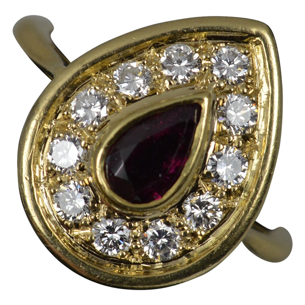 Beautiful 18 Carat Gold Pear Cut Ruby and Vs Diamond Cluster Ring For Sale