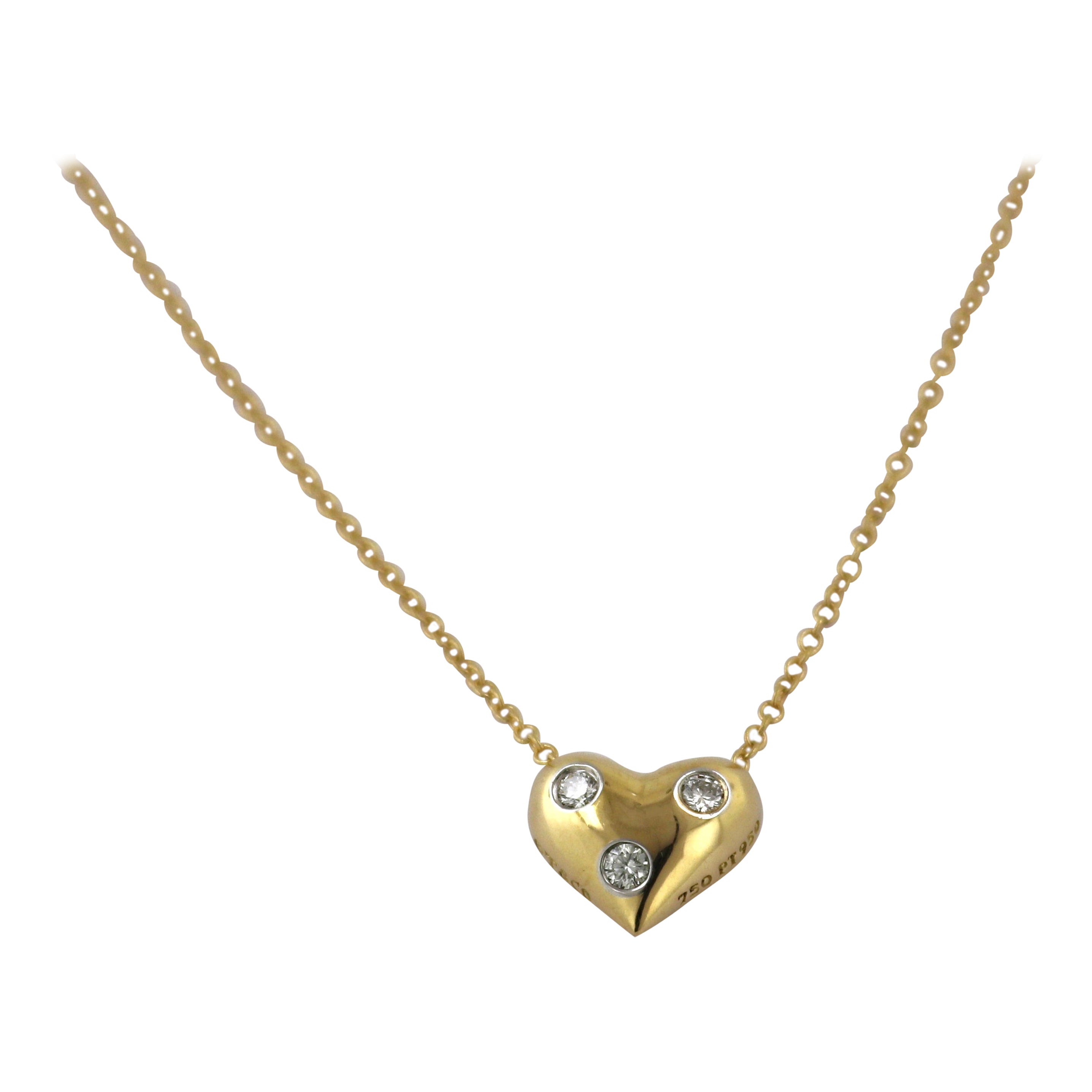Tiffany & Co., Diamond, Platinum, 18k Yellow Gold Etoile Puffed Heart Pendant