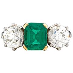 Classic emerald diamond Three stone ring 12