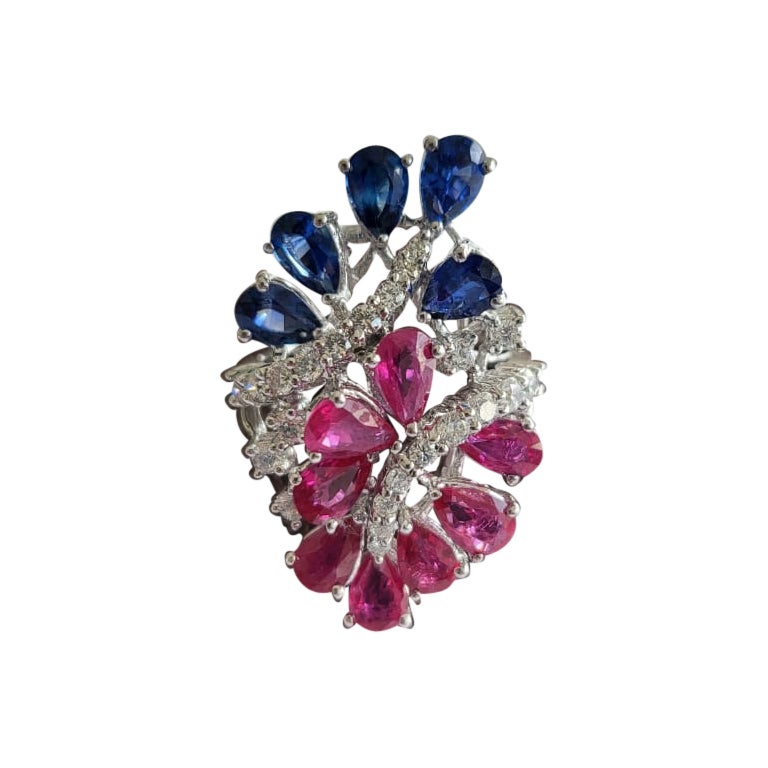 Set in 18k White Gold, 3.42 Carats, Ruby, Blue Sapphire & Diamonds Cocktail Ring For Sale