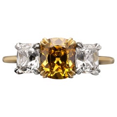 Hancocks 1.42ct Fancy Deep Orangey-Yellow Diamond Ring with Diamond Shoulders