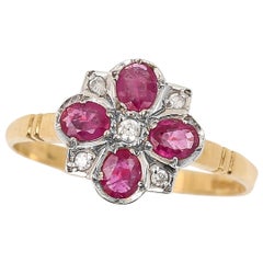 Contemporary 18 Carat Gold Ruby and Diamond Cluster Ring